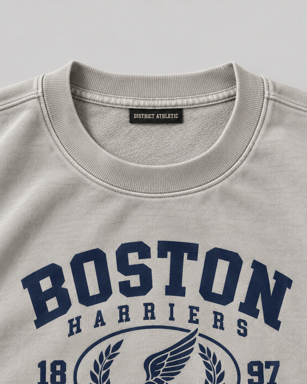 The Boston Harriers Crewneck in washed grey, collar and label detail