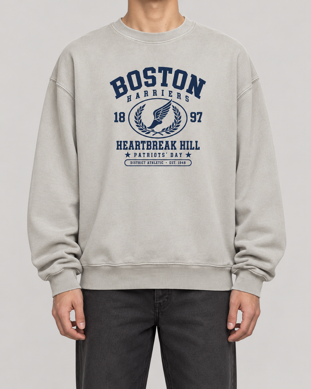 The Boston Harriers Crewneck in washed grey, on model, front
