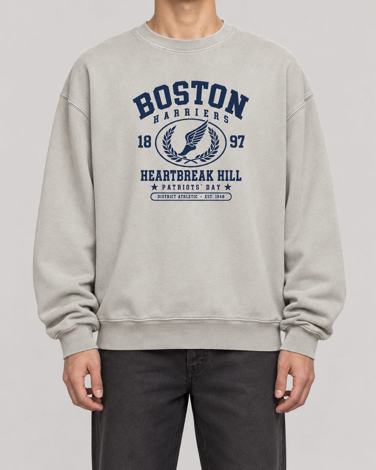 The Boston Harriers Crewneck in washed grey, on model, front