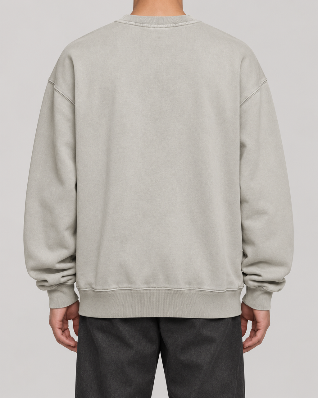 The Boston Harriers Crewneck in washed grey, on model, back