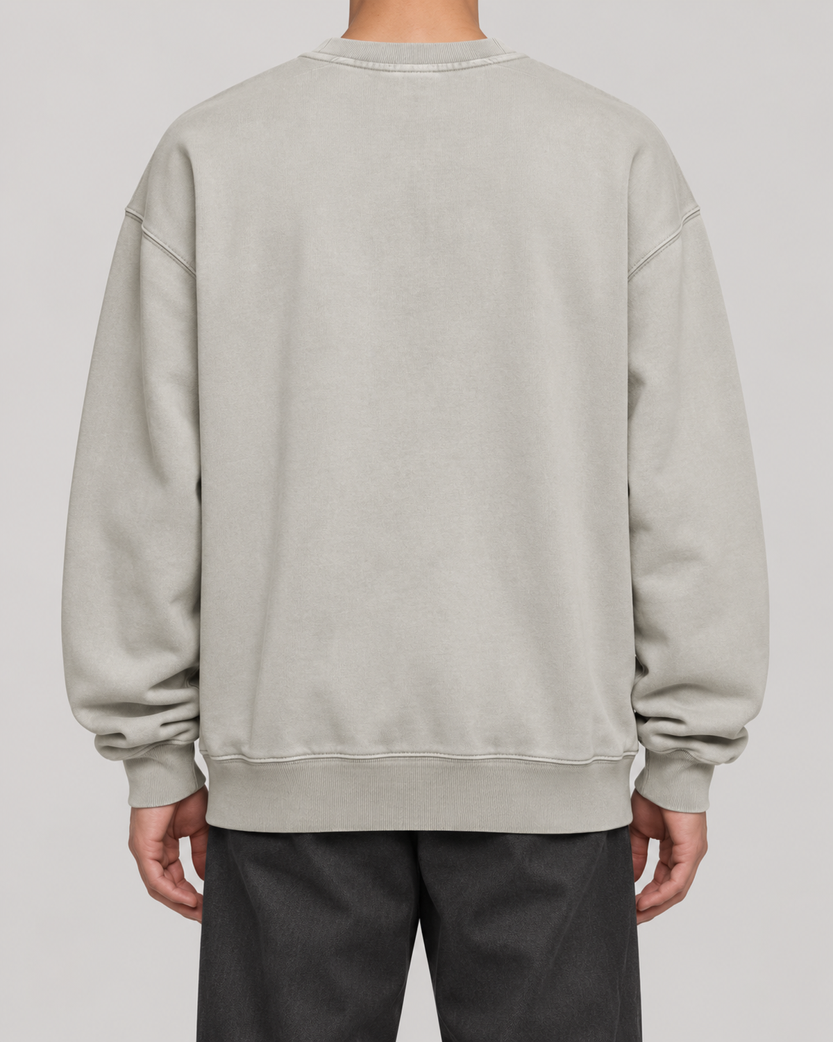 The Boston Harriers Crewneck in washed grey, on model, back