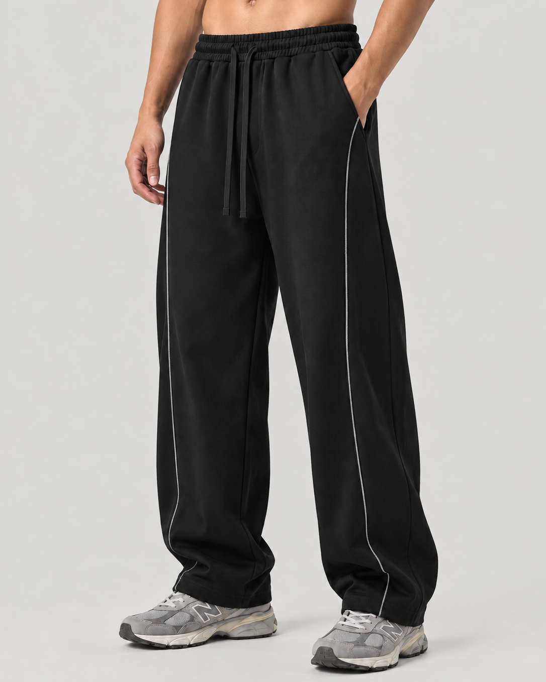 The Barrel Sweatpant in black, on model, front
