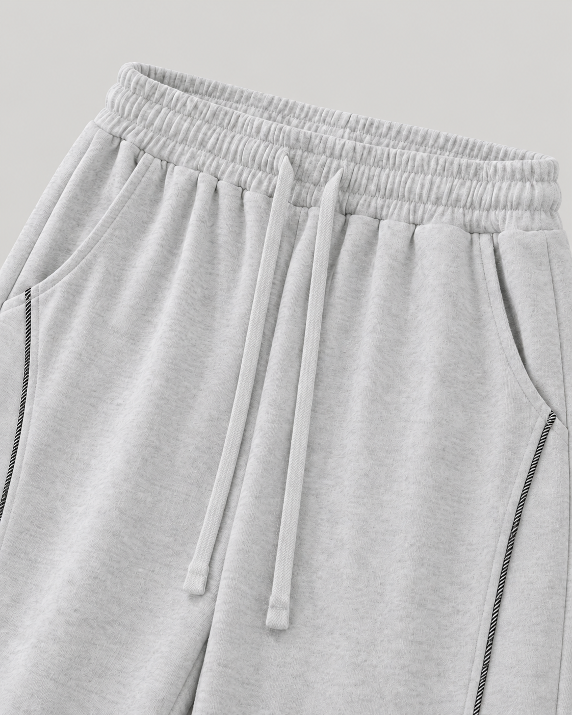 The Barrel Sweatpant in grey marl, waist and pocket detail