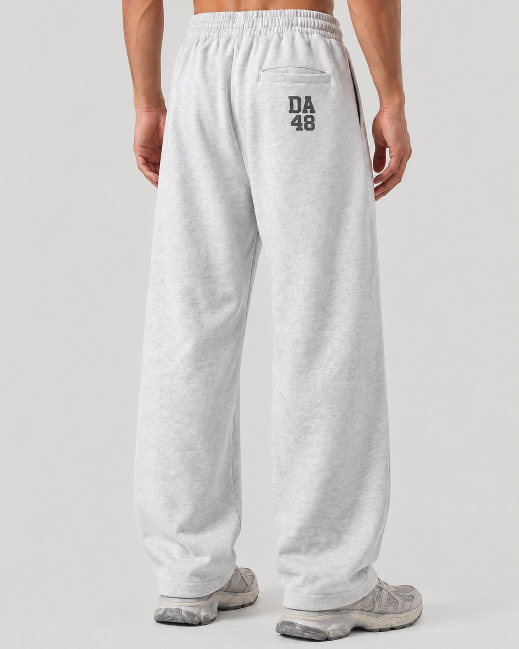 The Barrel Sweatpant in grey marl, on model, back