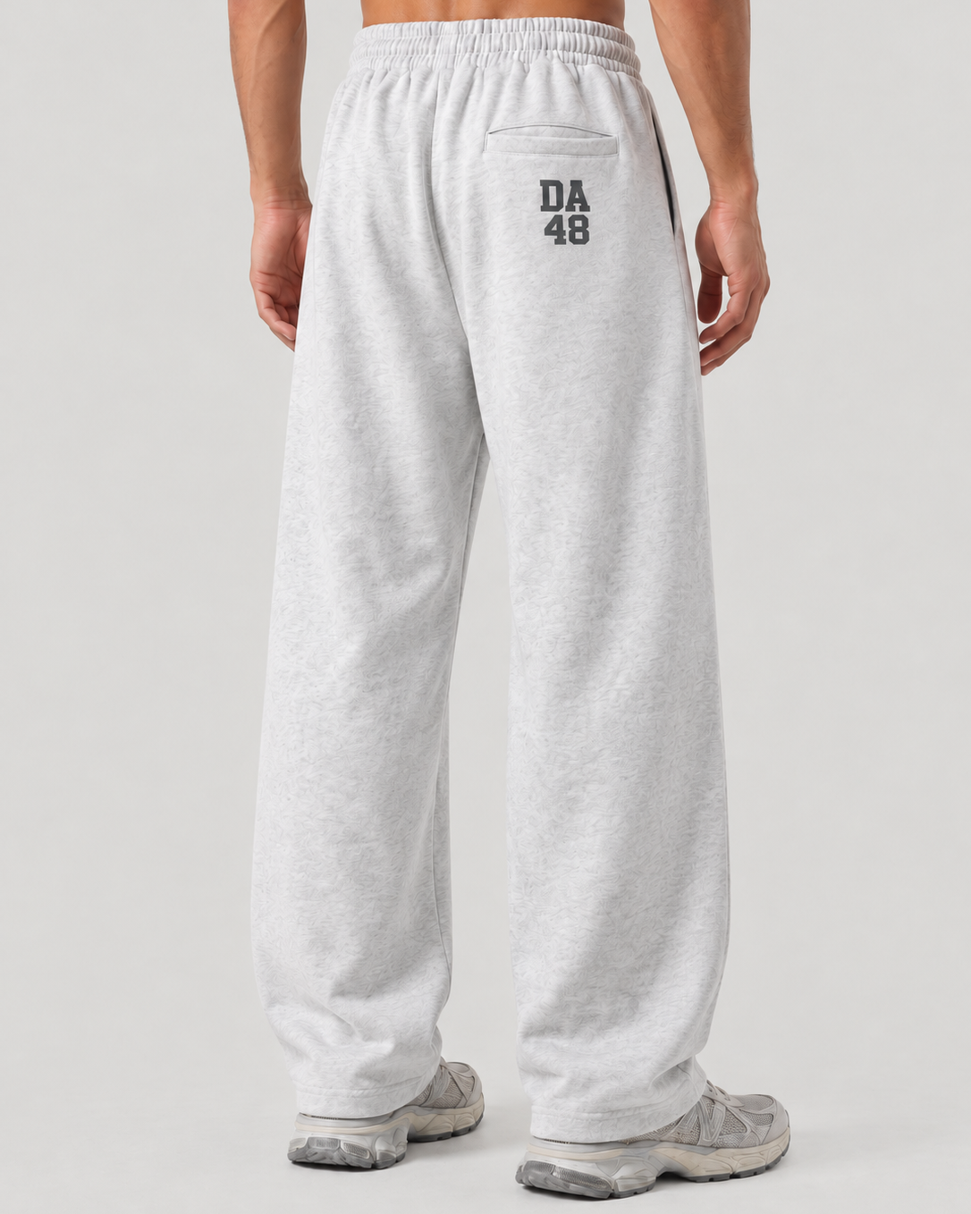 The Barrel Sweatpant in grey marl, on model, back