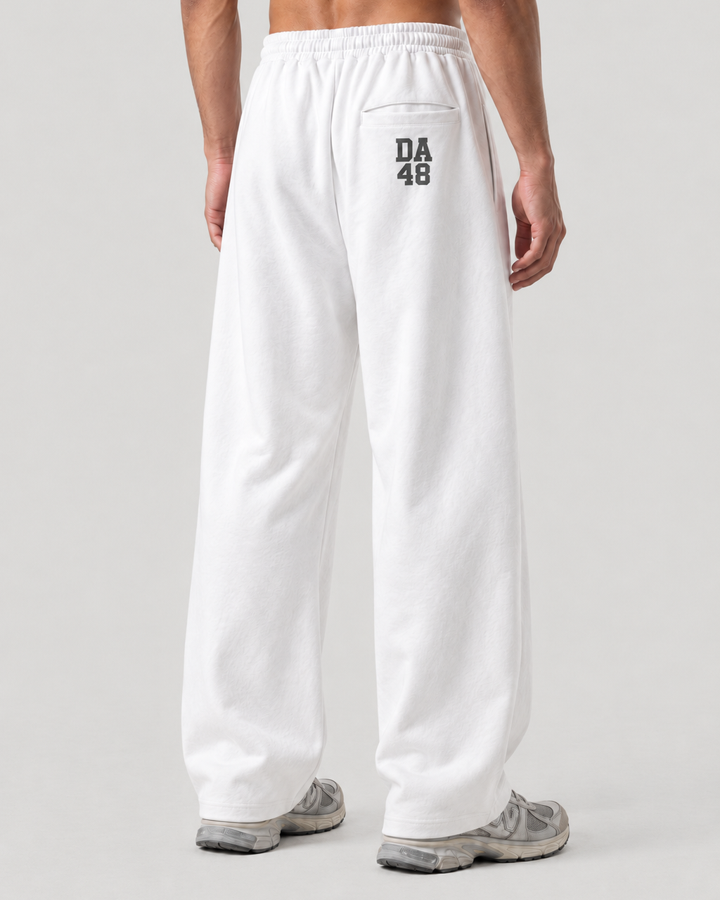 The Barrel Sweatpant in white, on model, back