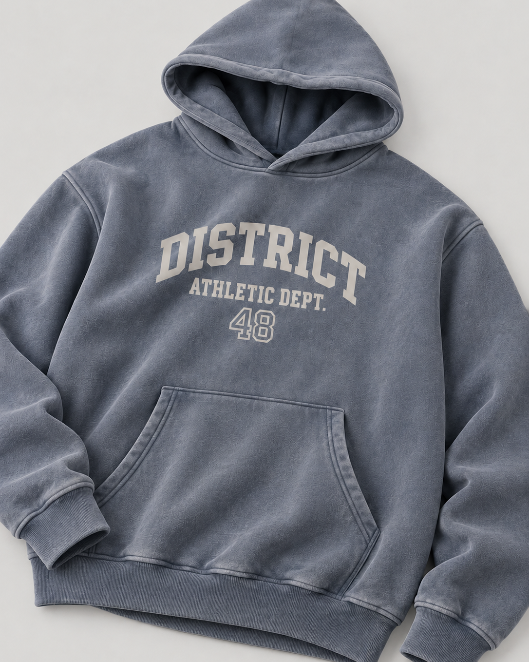 The District Hoodie in slate blue, chest print detail