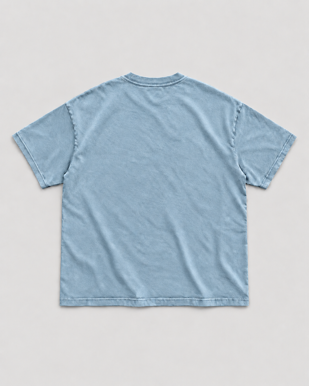 The Potomac Tee in blue with navy print, back