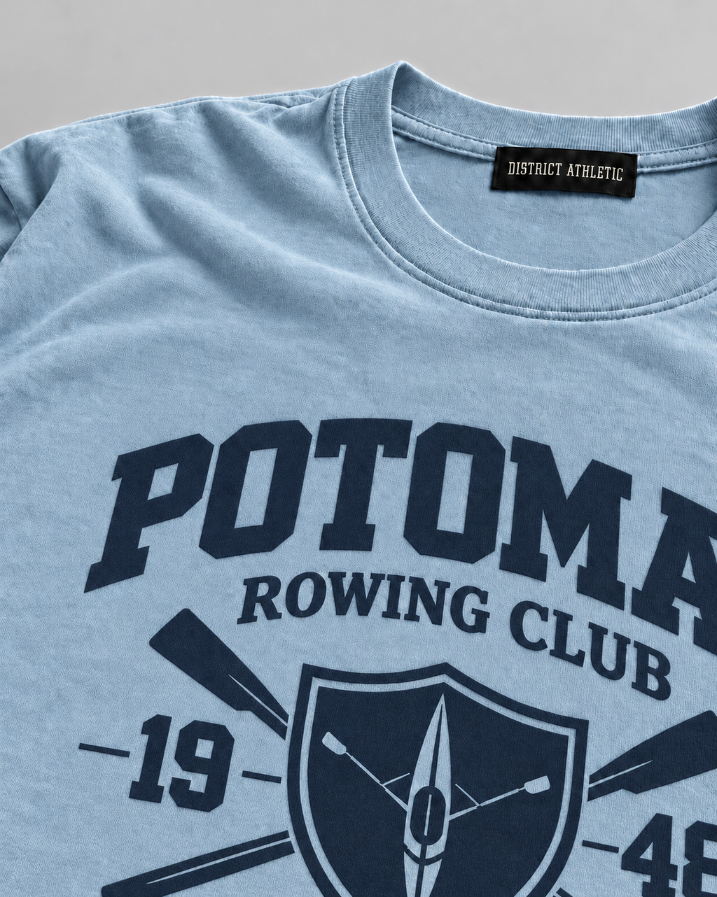 The Potomac Tee in blue with navy print, print detail