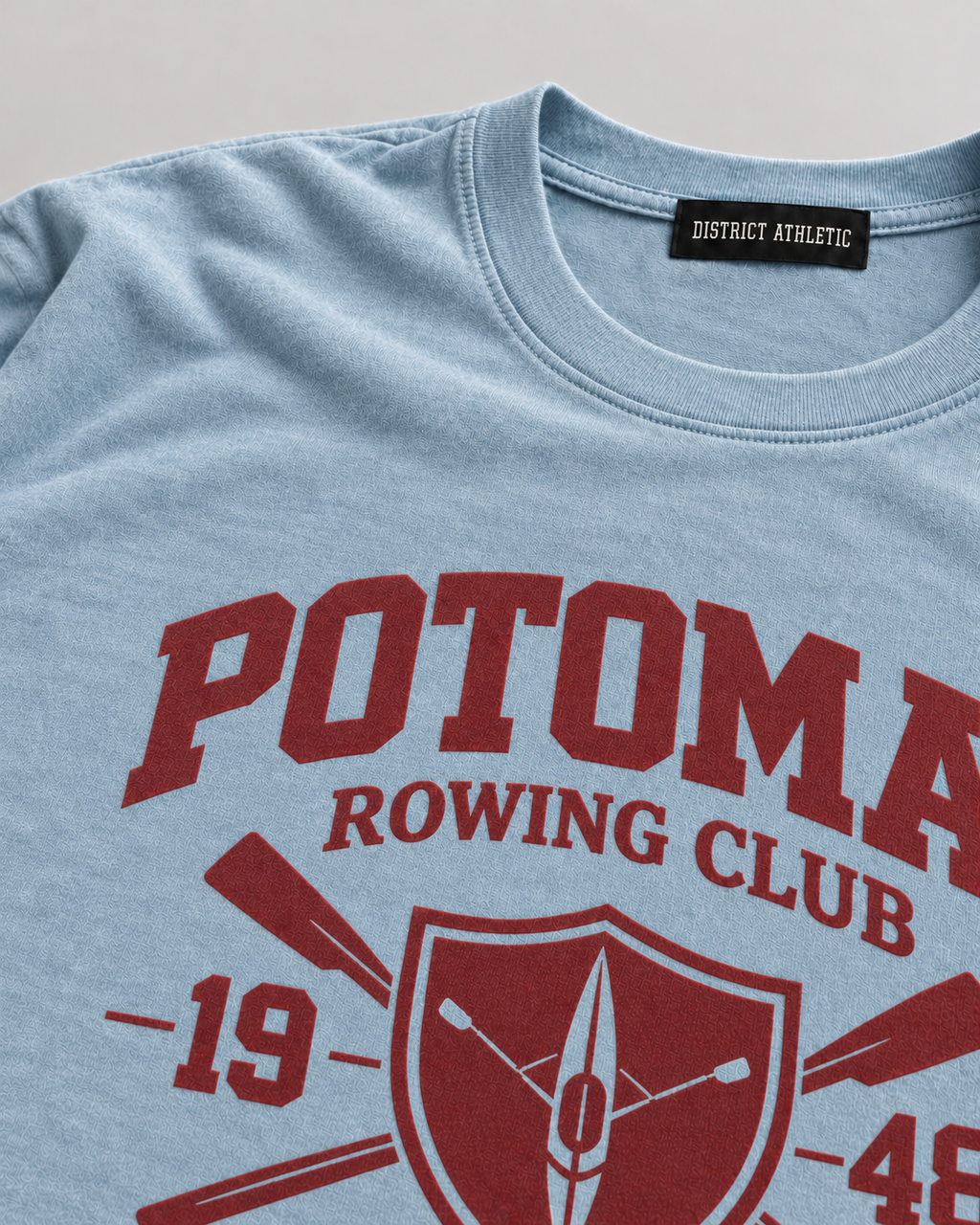 The Potomac Tee in blue with red print, print detail