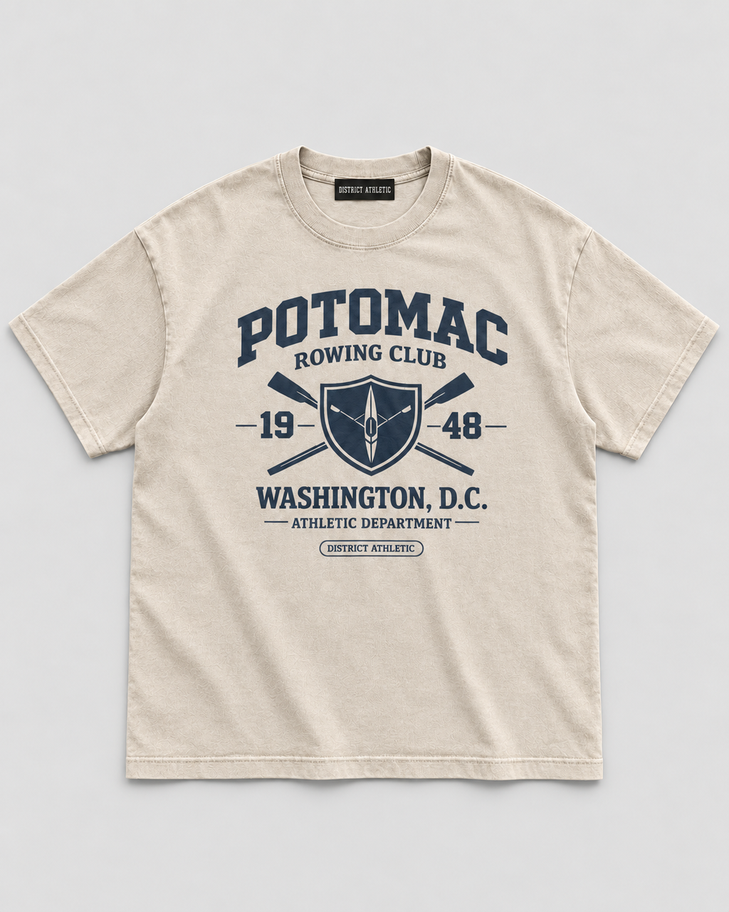 The Potomac Tee in sand with navy print, front