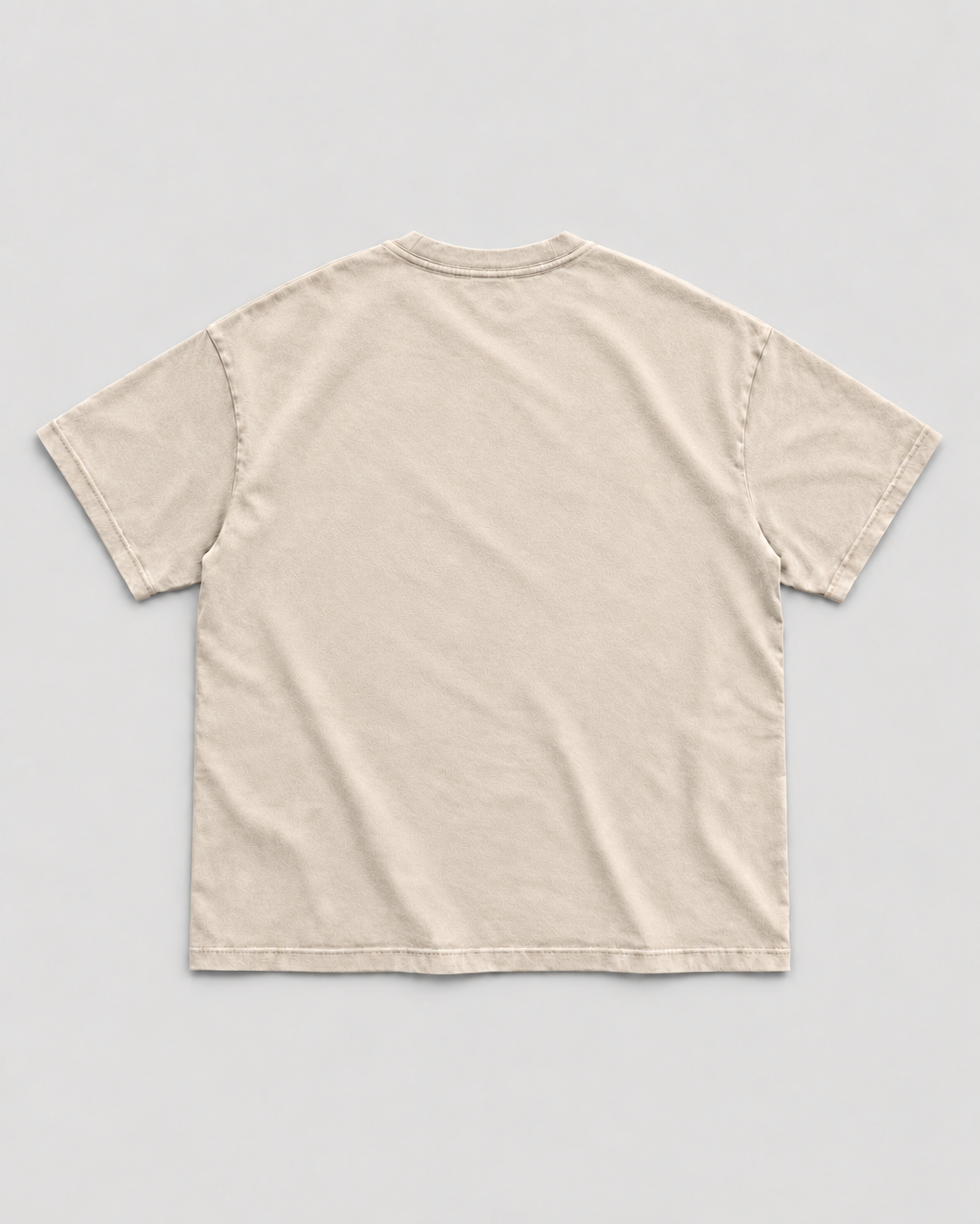 The Potomac Tee in sand with navy print, back